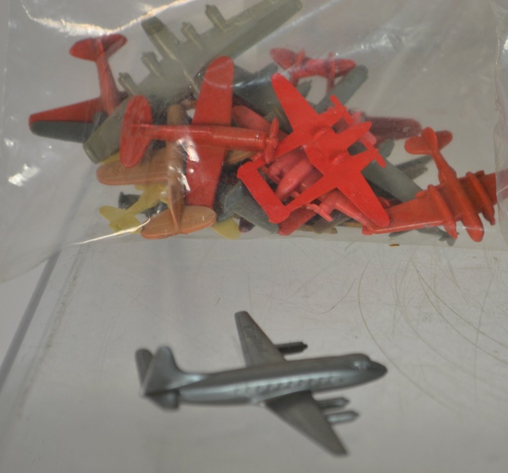Lot of Kix Premiums: Lot Of Kix Premiums including: Original Advertisement For Kix Cereal, Plane Premiums, planes included are Plastic, and metal
