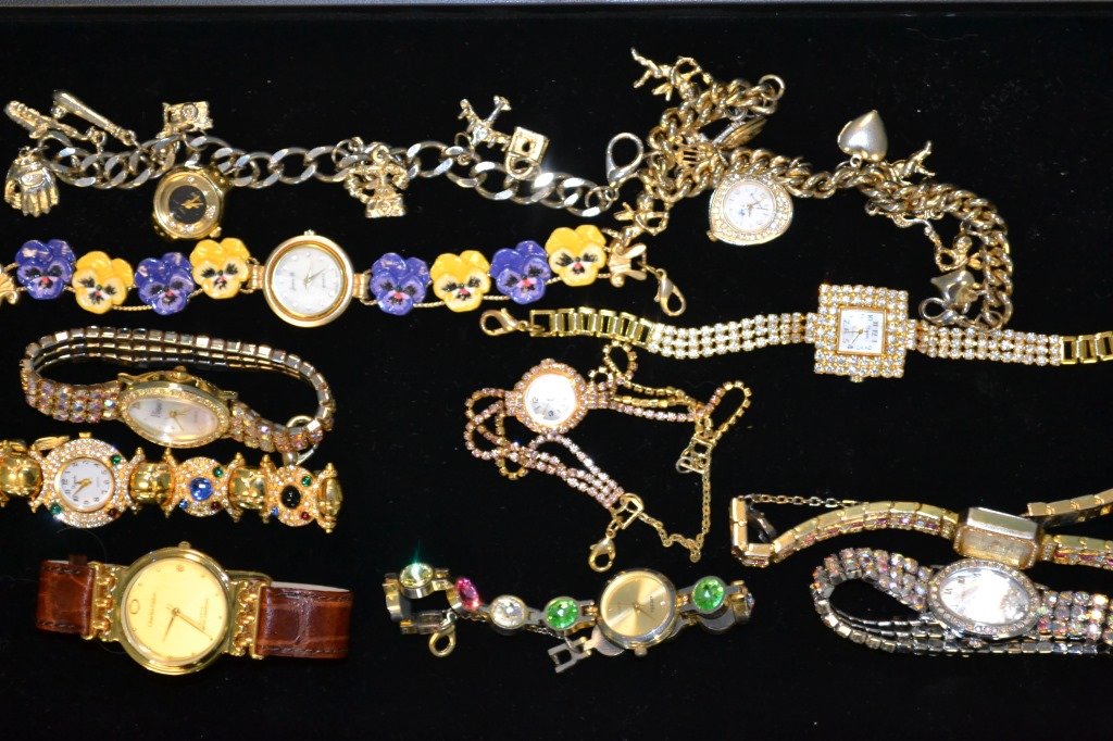 Tray of Costume Watches & Rhinestone Watches: Tray of Costume Watches & Rhinestone Watches including: Charm bracelets, Rhinestone watches, and costume watches, etc.