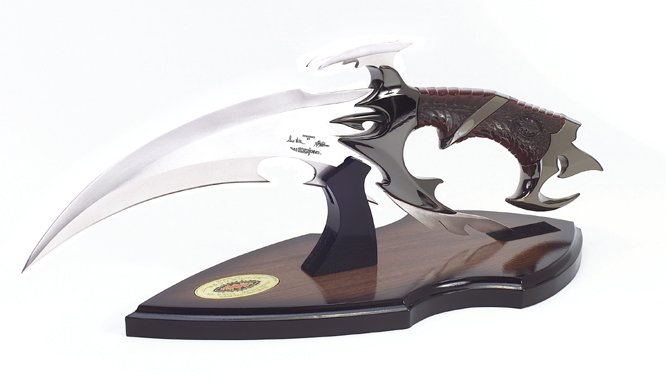 Gil Hibben Kit Rae Eye of Drakonus Knife: Gil Hibben Kit Rae Eye of Drakonus Knife with four unique 420 stainless steel blades complement the handle design and the main fantasy style blade bears the precision laser-etched signatures of the fa