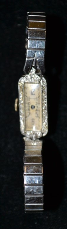900 Platinum Ladies Watch by Waltham: 900 Platinum Ladies Watch by Waltham w/ 15 Diamond Accents. (needs hands & movement/ face repair)