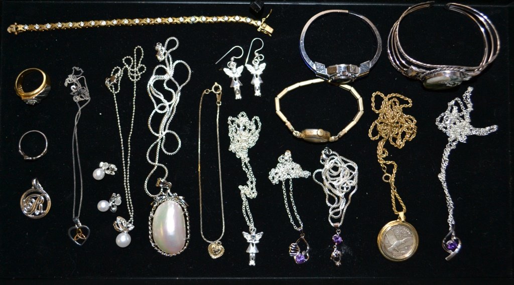 Collection of Costume Jewelry: Collection of Costume Jewelry including some sterling silver items, as well as 1776 2Gr Silver piece in gold colored pendant, lady's wrist watches, etc