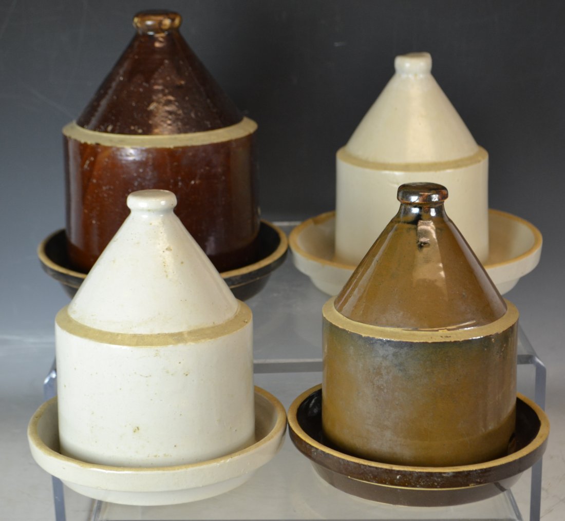 4 Early 20th C Stoneware Chicken Feeders: 4 Early 20th C Stoneware Chicken Feeders; includes 4 feeders and 4 under trays - 2 brown, 2 white; overall fair condition, minor base rim chips to 3 of the domes