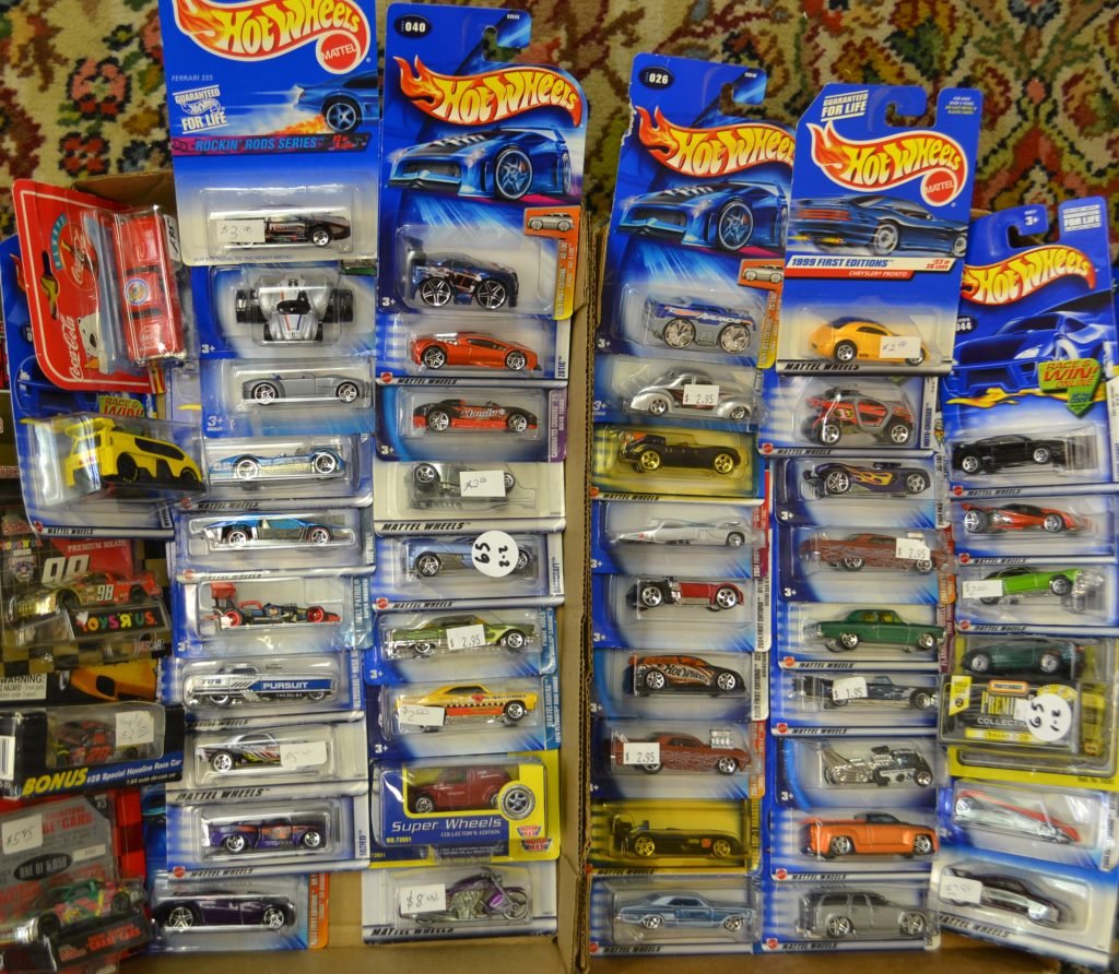 48 Hot Wheels, Matchbox, and Racing Champions Die: Approx. 48 New Old Stock Most in Original Card Back Bubble Displays Racing Champion, Hot Wheels, Match Box etc.