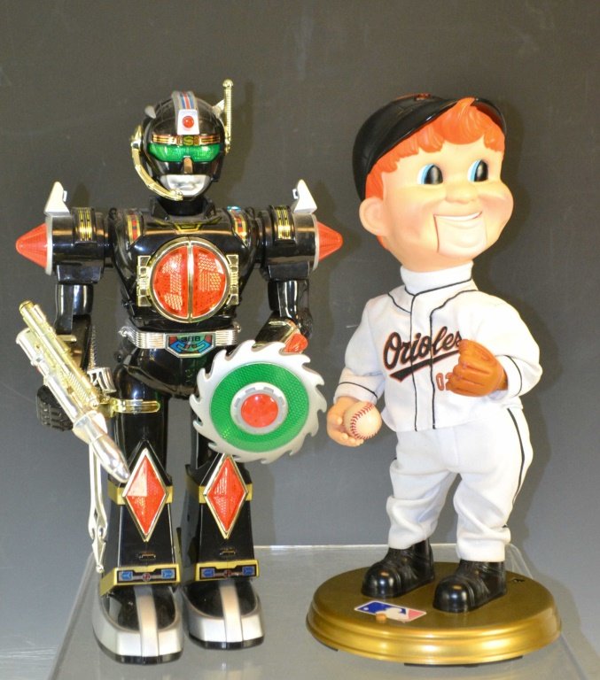 Orioles Animated Doll & Robot: Orioles animated talking doll along with a Sharper Image Robot, 2001, armored body (rotates, lights flash, weapons move and generate blast sounds, 3 voice commands, with all weapon accessories (sword,
