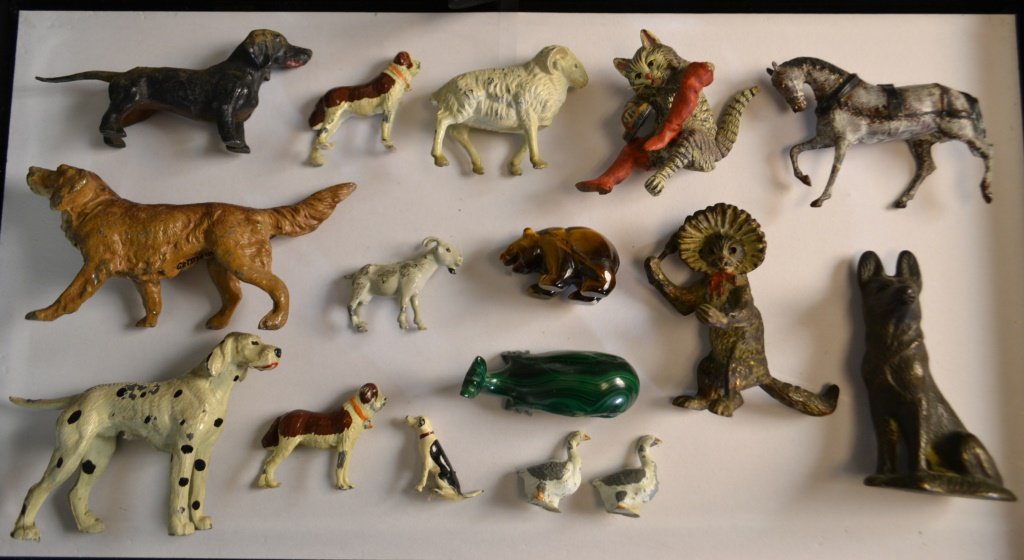Cast Iron & Other Vintage Metal Figures: Cast Iron & Other Vintage Metal Figures including: (7) Dogs, Puss n Boots, Metal Horse, Metal Goat , Ram, Geese, 2 stone carved figures,