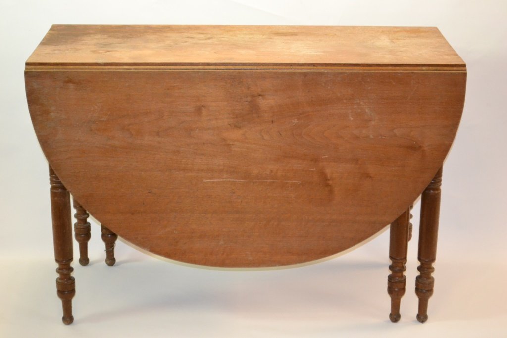 Drop Leaf Table: Drop Leaf Table measuring approx. 29.5"h x 45"w x 19"d (closed) open measuring approx 63"