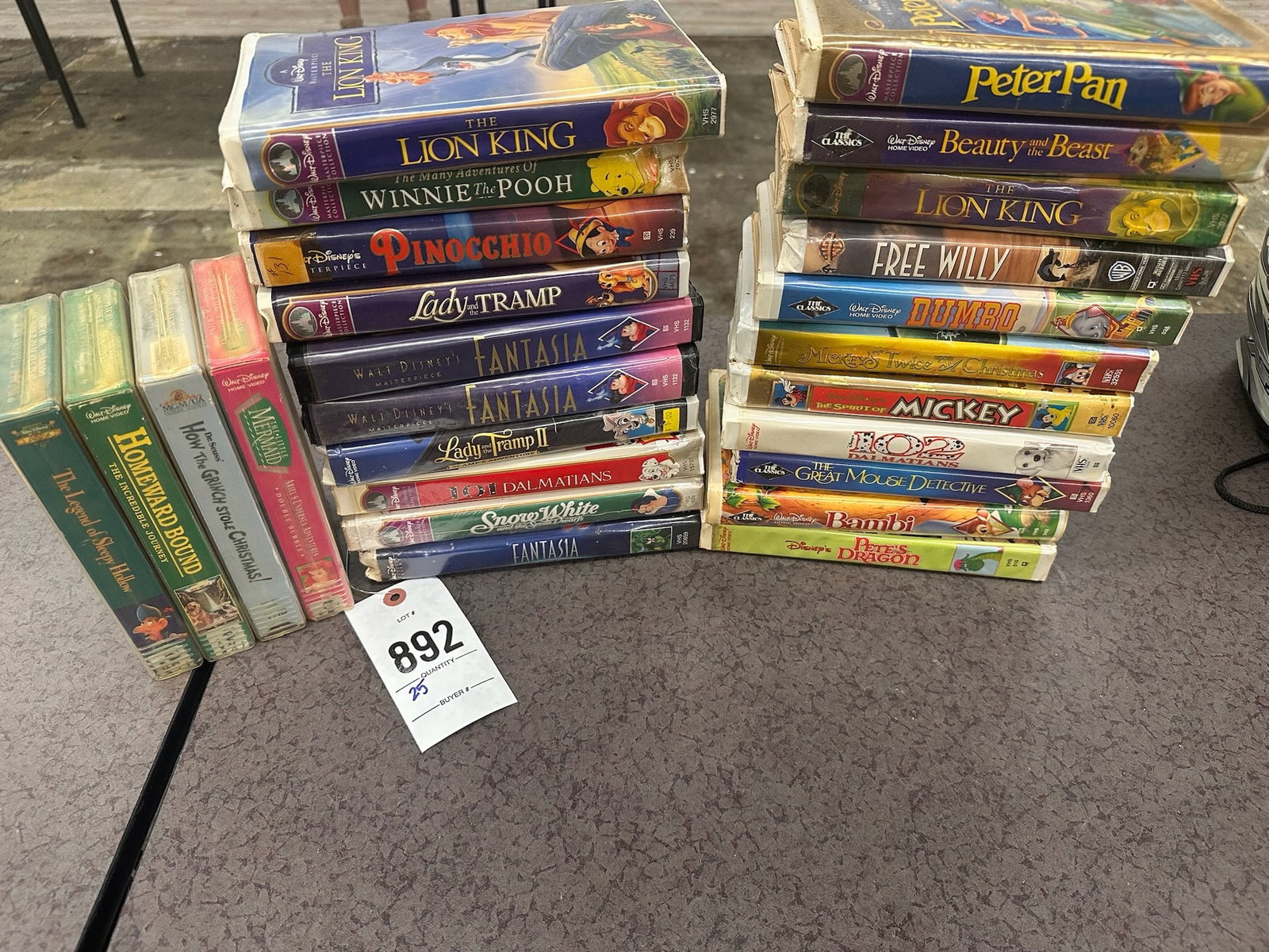 VHS Disney and Family Movies: VHS tapes featuring classic Disney titles such as 'The Lion King,' 'Beauty and the Beast,' 'Peter Pan,' and 'Winnie the Pooh,' as well as other family-friendly films like 'Free Willy' and 'Homeward