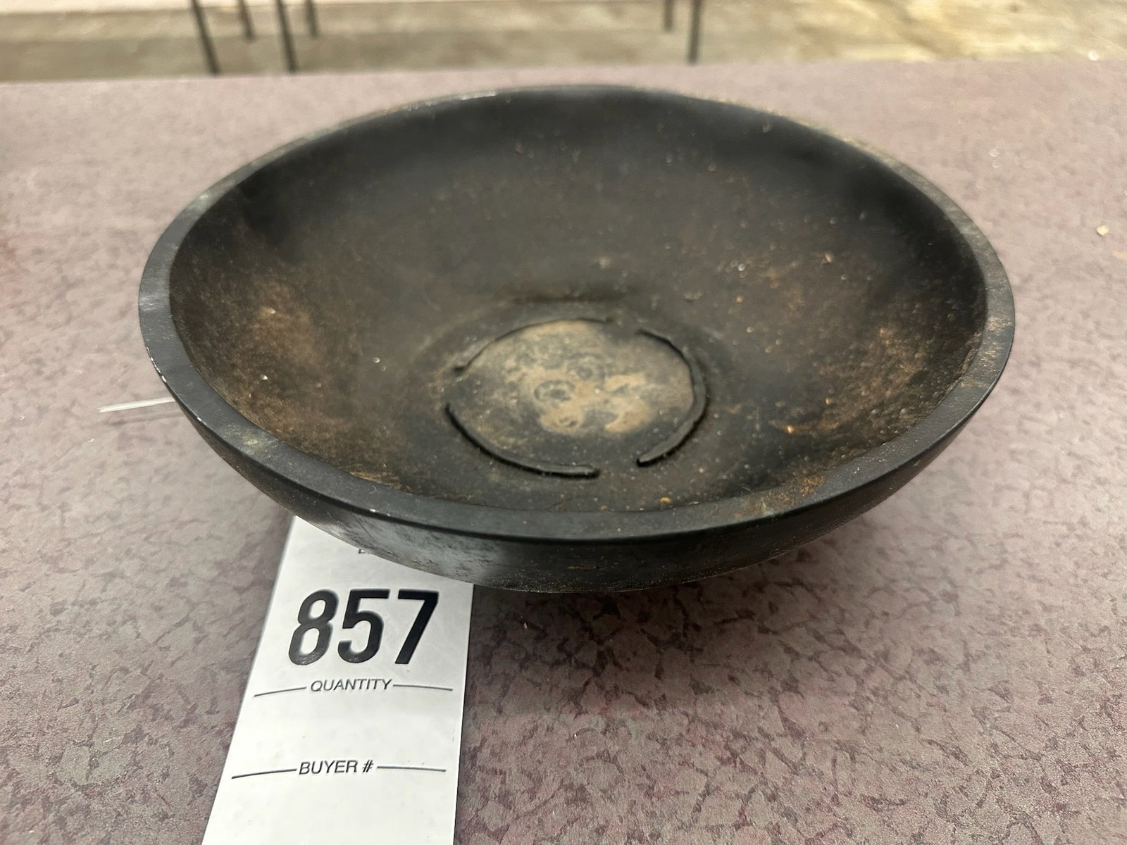 Black Decor Bowl with Rounded Design: Black decorative bowl. Features a simple, rounded design and a slightly concave interior.