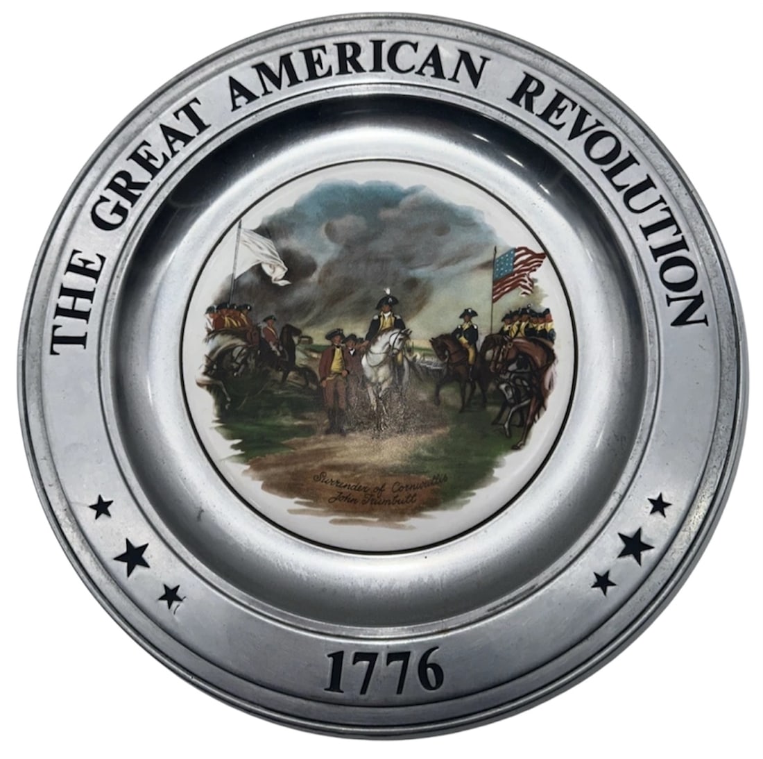 Bicentennial Commemorative Plate "The Great American Revolution 1776" – John Trumbull Centerpiece: A heavy, historical collector's plate honoring the birth of America. The outer wide rim is crafted from satin-finished metal (pewter or silver-tone alloy) featuring bold embossed lettering that reads