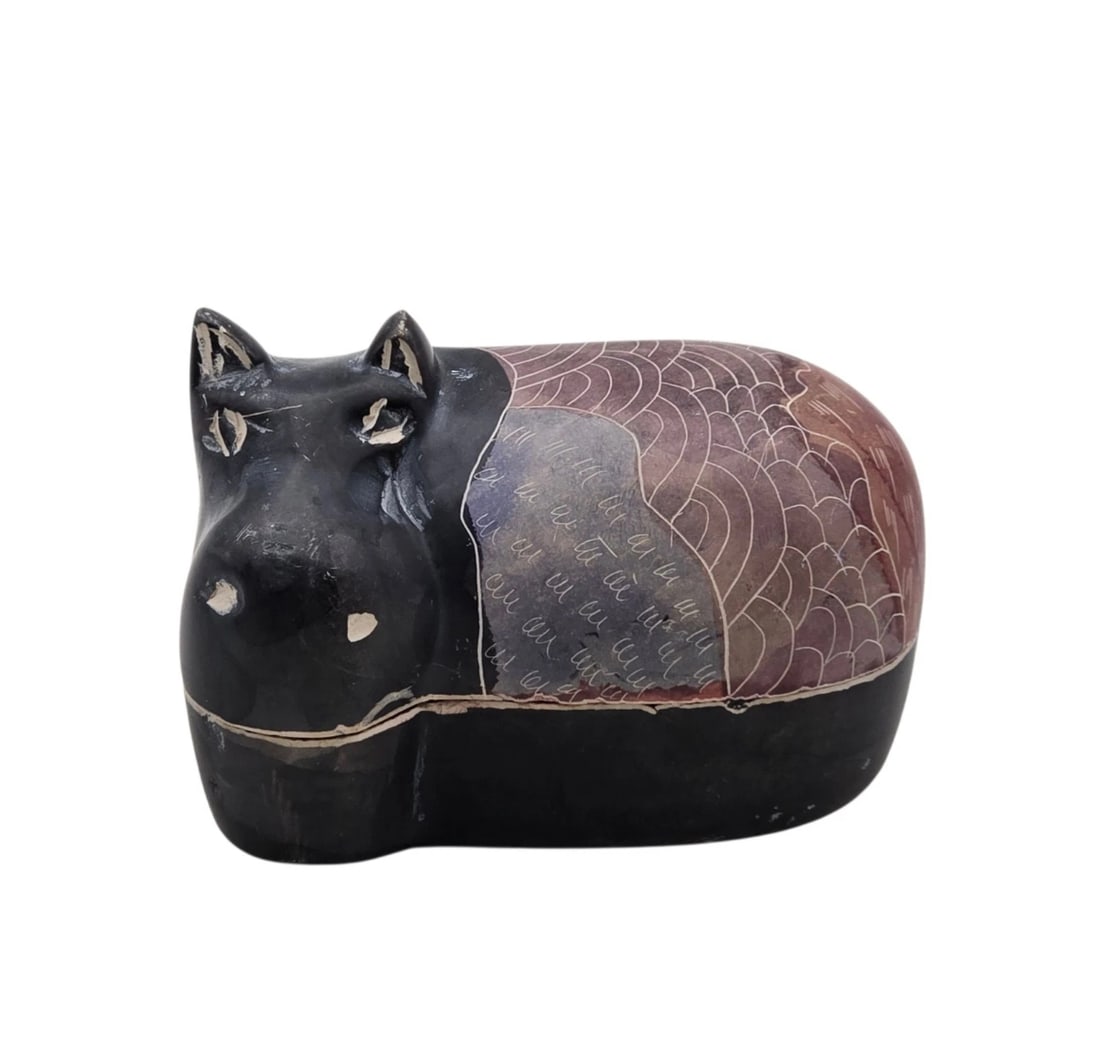 Vintage Hand-Carved African Soapstone Hippo Lidded Trinket Box - Etched Giraffe Design: This unique, hand-carved soapstone trinket box is shaped like a resting hippopotamus and splits open to reveal a small storage compartment. The lid features beautifully etched tribal swirl patterns an