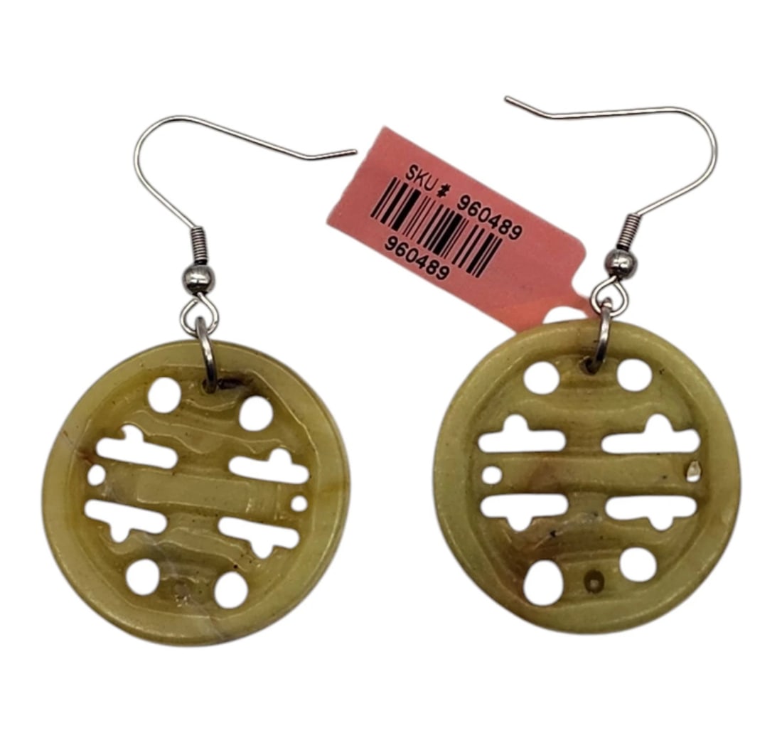 Echo of the Dreamer Carved Jade Asian Inspired Earrings: New with tags2" total hangA stunning pair of vintage dangle earrings crafted from smooth, natural olive-green jadeite stone. Each circular drop is intricately hand-carved with an elegant openwork desi