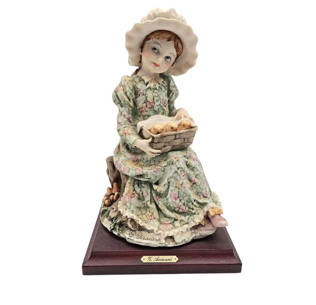Vintage G. Armani Girl With Chicks Members Only Sculpture Florence Italy 1982: sculpture by Giuseppe Armani. It portrays a sweet, rosy-cheeked country girl sitting on a woodland stump wearing a ruffled bonnet and a wonderfully detailed green and pink floral dress. In her lap, sh