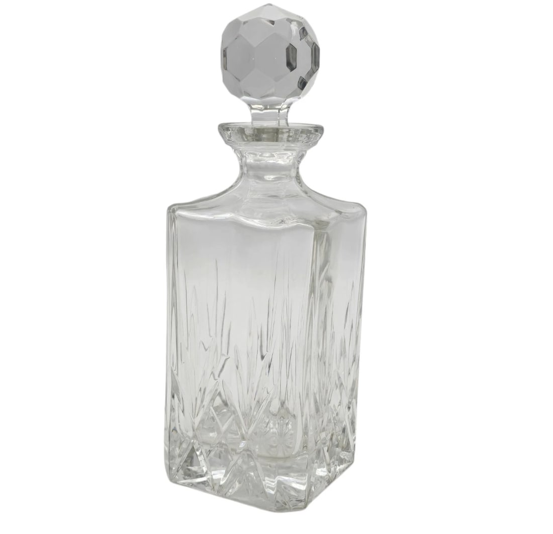 Cut Crystal Decanter with Round Stopper: Classic criss-cross diamond cut pattern with a heavy, multi-faceted geometric glass stopper. Instantly elevates any bar cart or liquor cabinet. Heavy, sturdy base that catches the light beautifully. G