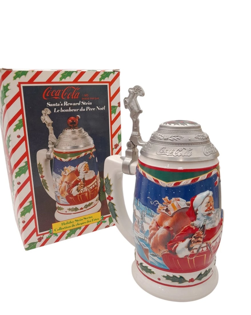 Coca-Cola Anheuser Busch Holiday Stein Series CS402 1999 SANTA's REWARD: Vintage 1990s Coca-Cola “Santa’s Reward” Holiday Stein Series collectible. Features a vibrant, embossed relief illustration of a classic Haddon Sundblom-style Santa Claus enjoying a bottle o