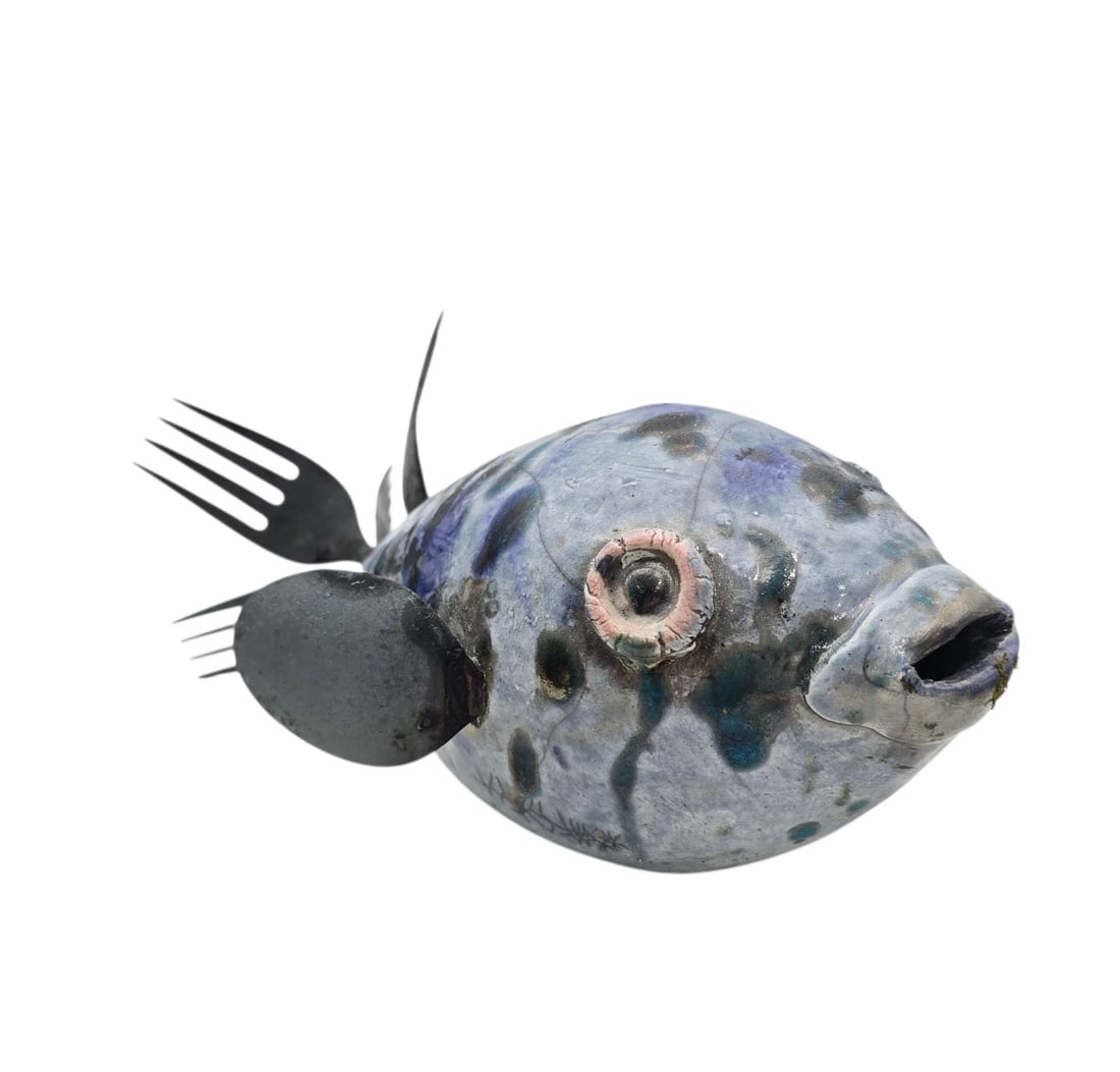 Vintage Upcycled Metal Forks Tail Ceramic Fish Art Sculpture Figurine: Unique studio art pottery whimsical fish sculpture. Hand-modeled clay body finished in an abstract, speckled glaze of periwinkle blue, purple, and seafoam green with a rustic, textured look. The side 