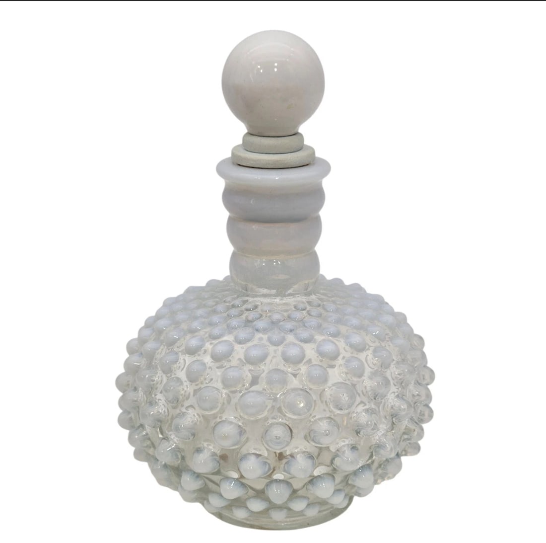 Vintage Milk Glass Hobnail Opalescent Moonstone Perfume Bottle With Stopper: Gorgeous vintage mid-century opalescent white milk glass perfume bottle or decorative vanity decanter in a classic hobnail pattern. Features a plump, rounded body entirely covered in raised glass nubs