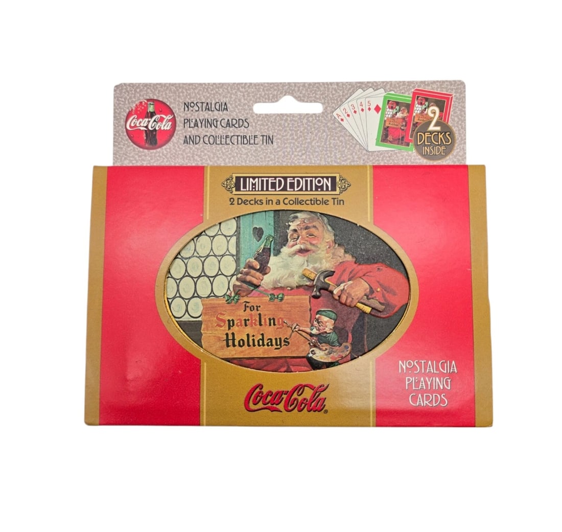 1998 Limited Edition Coca-Cola Nostalgia Playing Cards in Tin 2 Sealed Decks: Another fantastic seasonal find for the Coke collector. This Limited Edition holiday card set features a beautifully detailed, oval-framed nostalgic illustration of Santa Claus holding a classic glass