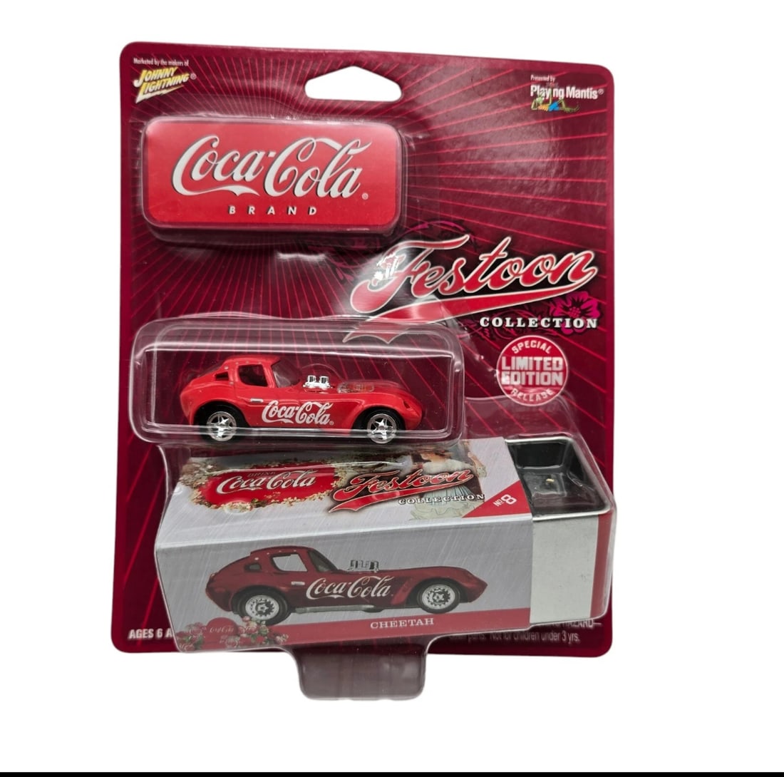 Johnny Lightning Coca-Cola Festoon Collection "Cheetah" Race Car (Special Limited Edition): A sleek addition to your shelf! Part of the Coca-Cola Festoon Collection (No. 8), this high-quality Cheetah race car features a vibrant candy-apple red paint job decorated with classic white script lo