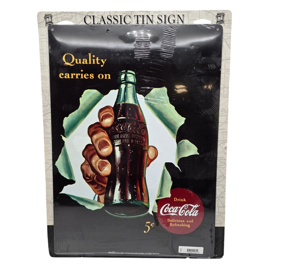 1942 VTG Coke Coca Cola Soda Original Magazine Ad Quality Carries On Bottle: A striking reproduction of a historic advertisement. This sign features a dramatic graphic of a hand tearing through black paper to reveal a frosty glass bottle of Coca-Cola, highlighted with vintage-