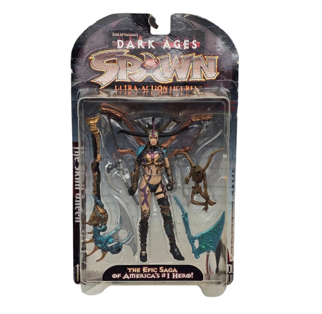 McFarlane Toys Spawn Dark Ages Skull Queen Figure 1998 Series 11 New: A vintage, highly detailed, carded "Ultra-Action Figure" from Todd McFarlane's Spawn: Dark Ages toy line. The figure depicts a fierce female warrior character—The Skull Queen—featuring intricate, 