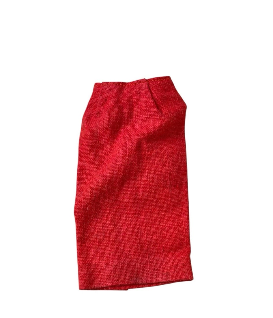 Vintage Barbie Busy Gal #981 Red Skirt Only 1960 Mattel: A simple, high-waisted vintage doll pencil skirt made from a textured, tightly woven red knit or linen-like fabric.