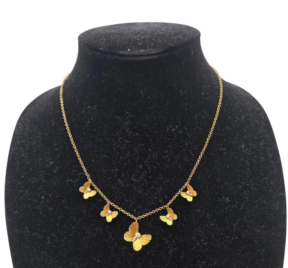 Dyadema 925 Sterling Silver Yellow Gold Vermeil 4 Butterfly's Coker: A delicate gold-toned link chain necklace decorated with five textured butterfly charms evenly spaced along the front drop. Each matte gold butterfly features realistic wing ridges and is accented wit