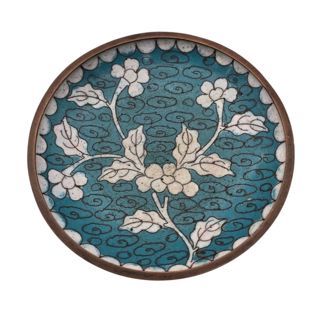 Saucers Cloisonne Vintage Chinese Blue With Blossom Teal And White: A vintage, round Chinese cloisonné enamel trinket dish or coaster. It features a light teal-blue background patterned with delicate dark scroll clouds, centered by a white-blossomed branch with leave