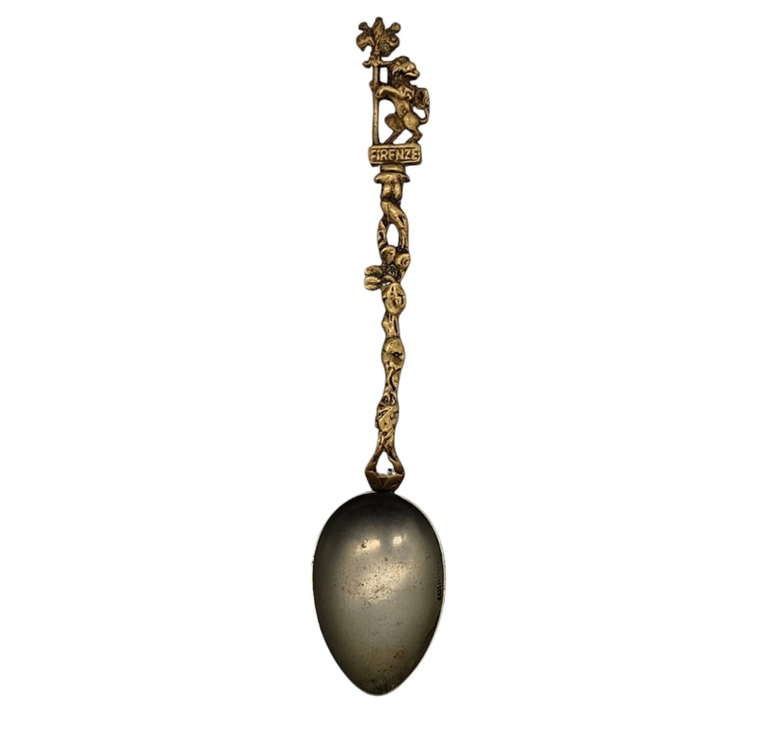 Vintage Souvenir Spoon Collectible Firenze Montagnani Style Italy: rare antique cast brass souvenir spoon from Florence (Firenze), Italy. The ornate openwork handle features twisted vine motifs leading up to a detailed finial of the historic Florentine Marzocco lion 