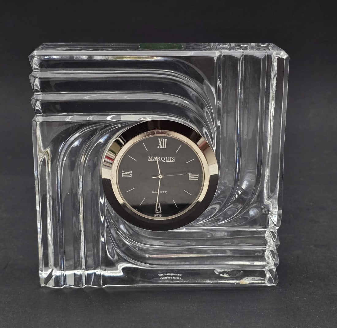 Waterford Glass Crystal Desk Clock Looking Modern Minimalist Mid Century Modern: A sophisticated Marquis by Waterford lead crystal desk or mantle clock. The heavy, square glass block frame features a dramatic molded geometric wave or swirl pattern that perfectly frames a polished 