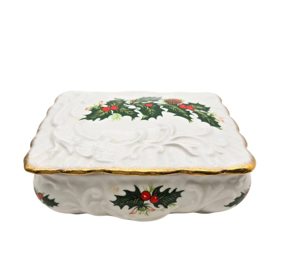 Queens Bone China Vintage Holly Berry Porcelain Christmas Trinket Box Gold Trim: A festive vintage square porcelain holiday trinket or jewelry box. Crafted with a beautiful embossed scrolling vine design in the white porcelain, accented by a hand-painted festive holly leaf and red