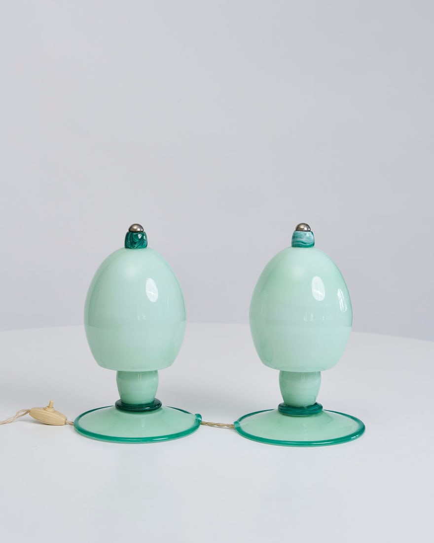 Napoleone Martinuzzi, Pair of Incamiciato table lamps model 9012: Napoleone Martinuzzi Pair of Incamiciato table lamps model 9012 Venini Italy, c. 1930 lattimo glass, silver 10.5 H x 6.5 W inches 27 H x 17 W cm