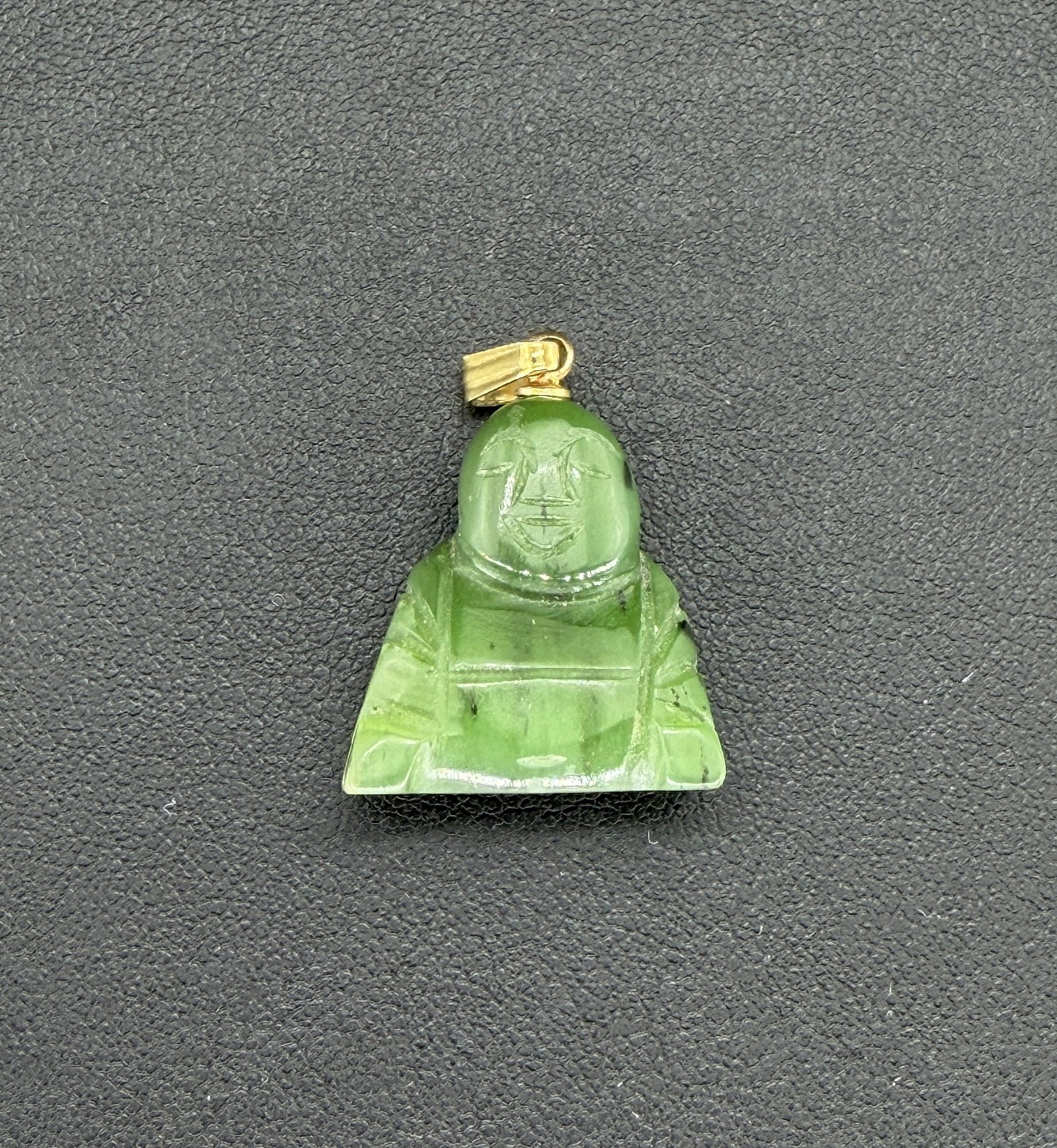 Pre-owned Carved Green Nephrite Jade Buddha Pendant Fitted With A Polished Yellow Gold Bail: 1. Pre-owned- Carved green nephrite jade Buddha pendant fitted with a polished yellow gold bail2. All stamps hallmarks or markings are shown as received and are for reference purposes only. Verificati
