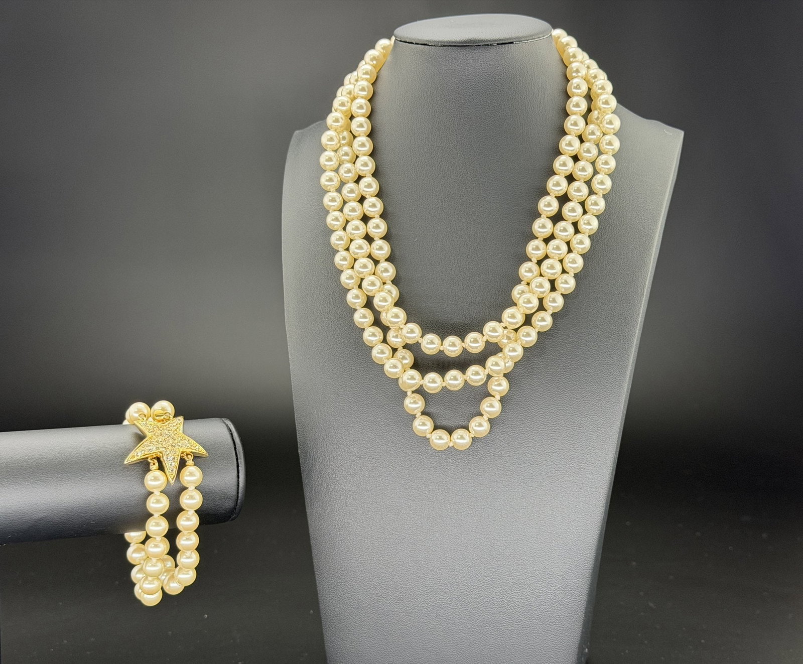 Pre-owned Vintage Multi-Strand Faux Pearl Necklace & Bracelet Set With Gold-Tone Star Clasp: 1. Pre-owned-Vintage Multi-Strand Faux Pearl Necklace & Bracelet Set with Gold-Tone Star Clasp2. All stamps hallmarks or markings are shown as received and are for reference purposes only. Verific