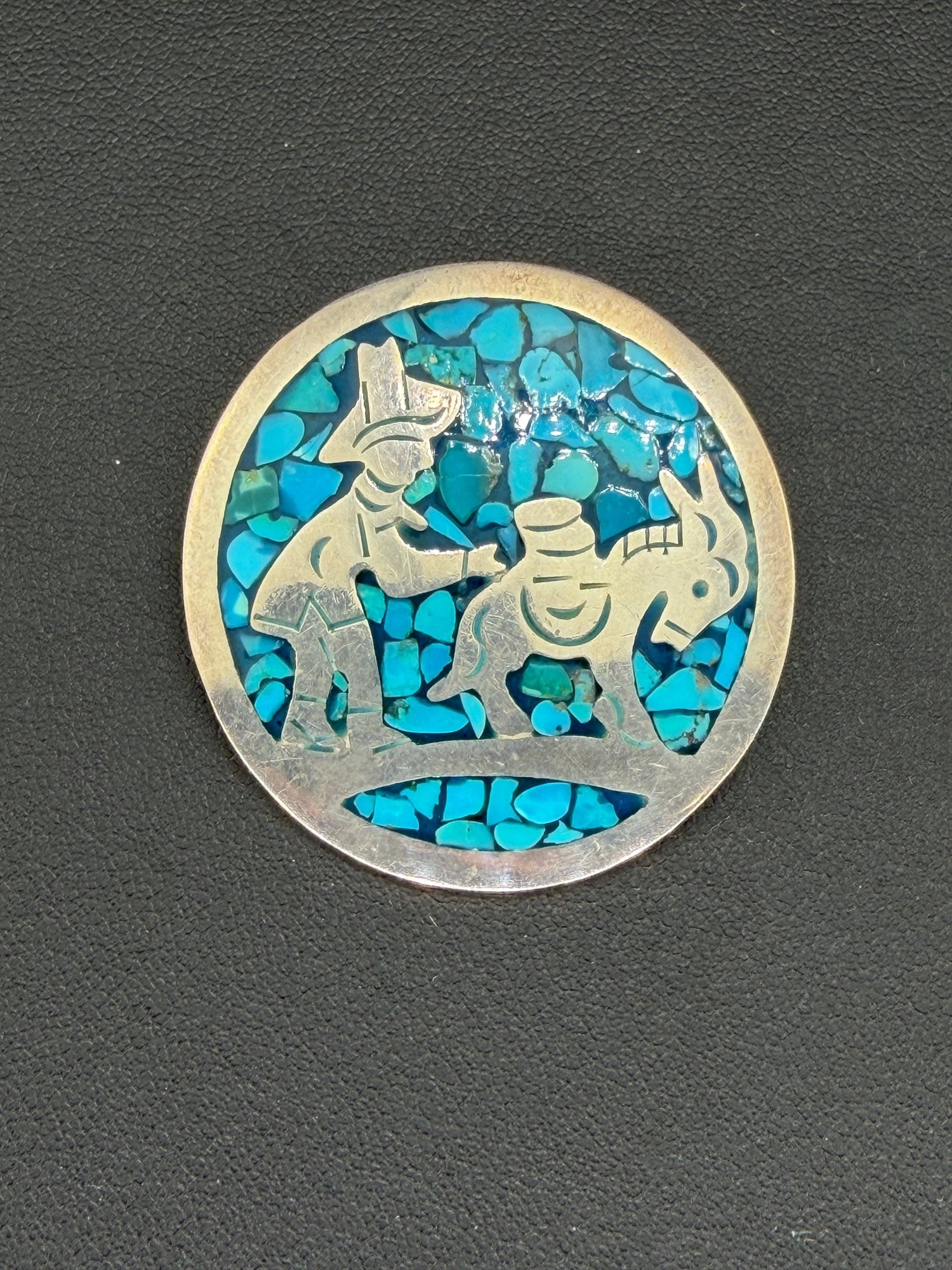 Pre-owned Vintage Sterling Silver 925 Turquoise Chip Inlay Donkey & Man Brooch Pendant: 1. Pre-owned- Vintage Sterling Silver 925 Turquoise Chip Inlay Donkey & Man Brooch Pendant2. All stamps hallmarks or markings are shown as received and are for reference purposes only. Verificatio
