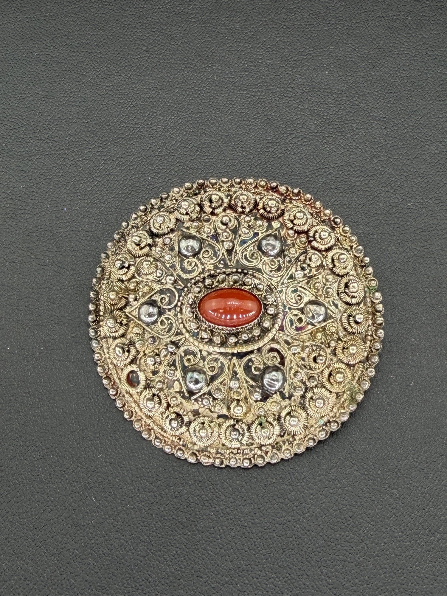 Pre-owned Rare Antique Mandate-Period 950 Silver Palestine Filigree Rosette Brooch Pin W/ Natural: 1. Pre-owned- Rare Antique Mandate-Period 950 Silver Palestine Filigree Rosette Brooch Pin w/ Natural Red CoralYemenite-Bezalel Technique: The back of the brooch shows the distinct irregular hammer an