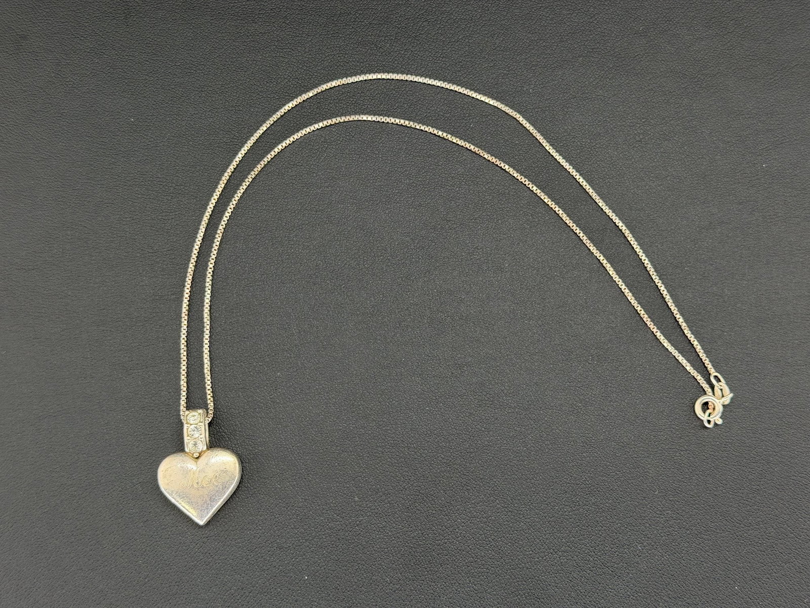 Pre-owned Vintage Sterling Silver Heart Pendant Necklace With Clear Crystal: 1. Pre-owned- Vintage Sterling Silver Heart Pendant Necklace with Clear Crystal2. All stamps hallmarks or markings are shown as received and are for reference purposes only. Verification is the sole r