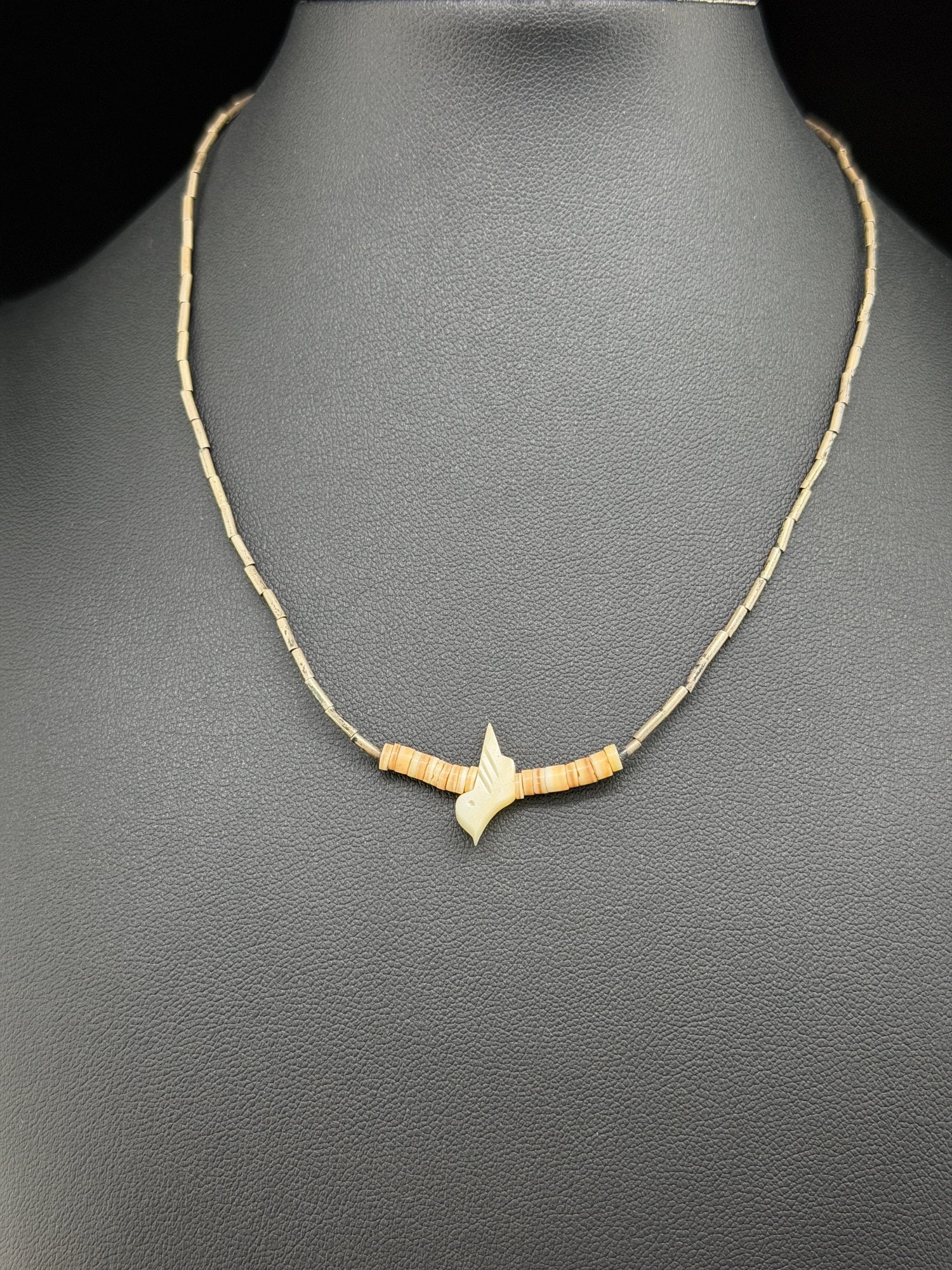 Pre-owned Sterling Silver Bird Necklace With Shell Heishi Beads AAA Southwestern Artisan Jewelry: 1. Pre-owned- Sterling Silver Bird Necklace with Shell Heishi Beads – Southwestern Artisan Jewelry2. All stamps hallmarks or markings are shown as received and are for reference purposes only. V