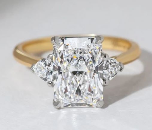 4 Carat Radiant Diamond 14kt gold Two Tone Trilogy Engagement Ring: 4 Carat Radiant Diamond 14kt gold Two Tone Trilogy Engagement Ring Us 7.00 us Ring Size change available