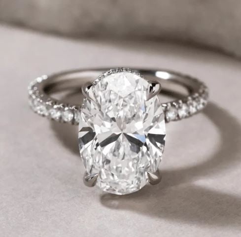 5 Carat Lab Grown Oval Diamond Hidden Halo Engagement Ring in 14kt Gold: 5 Carat Lab Grown Oval Diamond Hidden Halo Engagement Ring in 14kt Gold Ring Us 7.00 us Ring Size change available