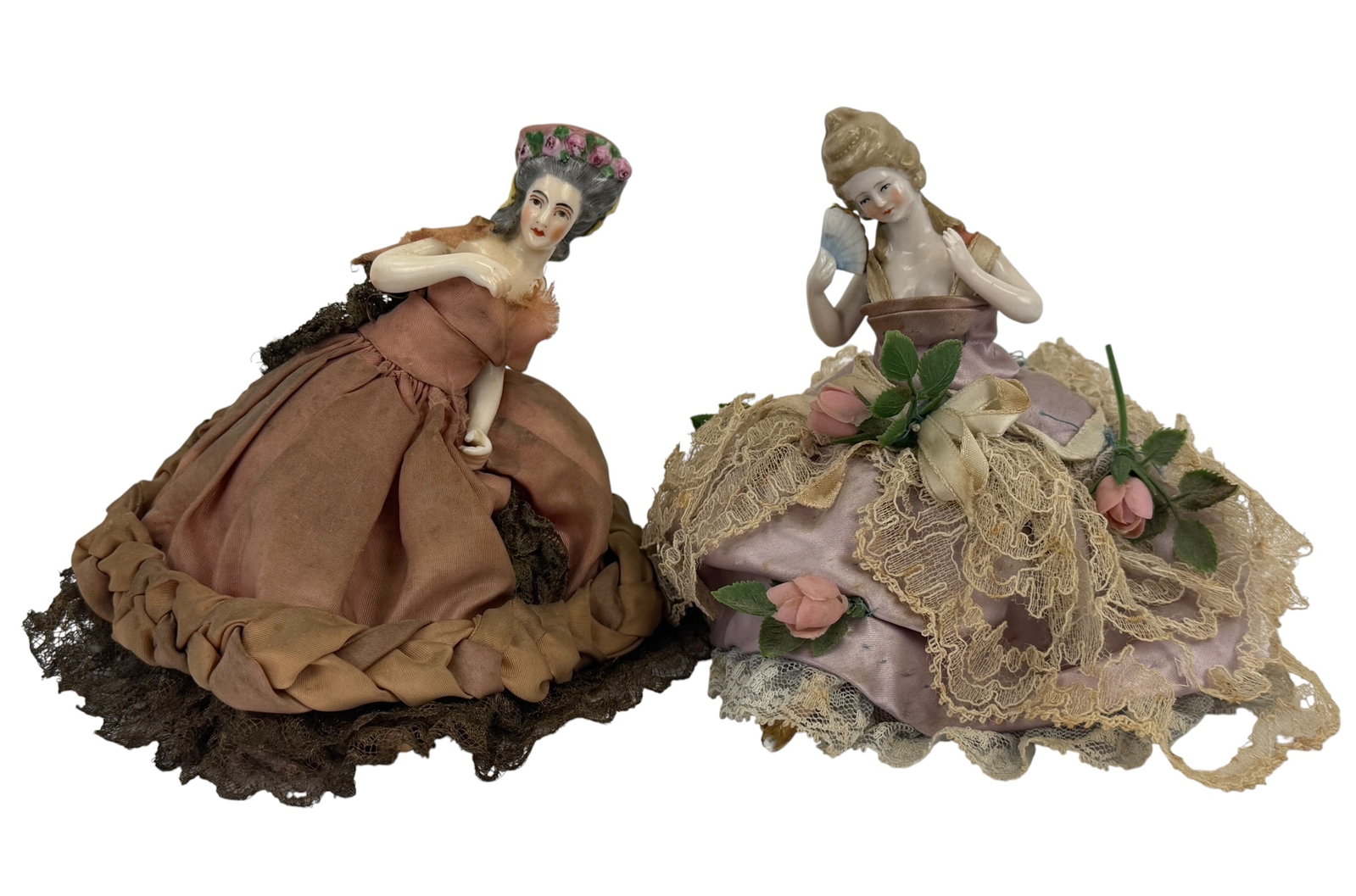 Pair of Victorian Pin Cushion Porcelain Antique Lace Half and Full Dolls: Pair of Victorian Pin Cushion Porcelain Antique Half and Full Dolls. The doll in the red skirt is not a half doll but a full bodied doll that is hinged to the pincushion. Provenance From the estate of