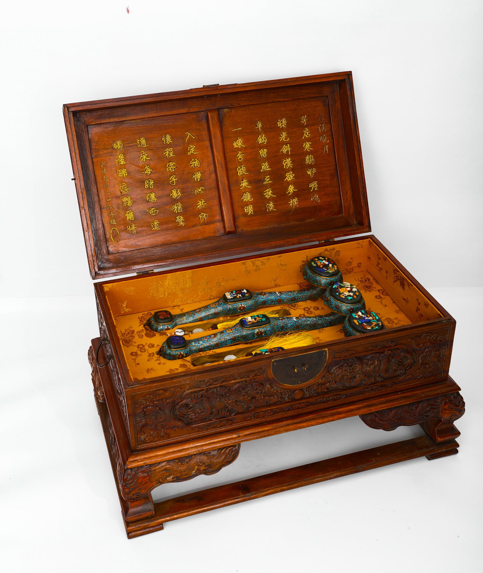 A SET OF QING DYNASTY COPPER BODY CLOISONNE ENAMEL INLAID RUYI (WITH A BOX OF YELLOW ROSEWOOD CARVED: H:40cm (15.75in) W:75cm (29.53in) Weight:15000g (33.07lb) Ruyi length L: 50cm (19.69in)This is a set of ruyi scepters with a matching wooden box in the Qing Dynasty palace style. The box is finely car