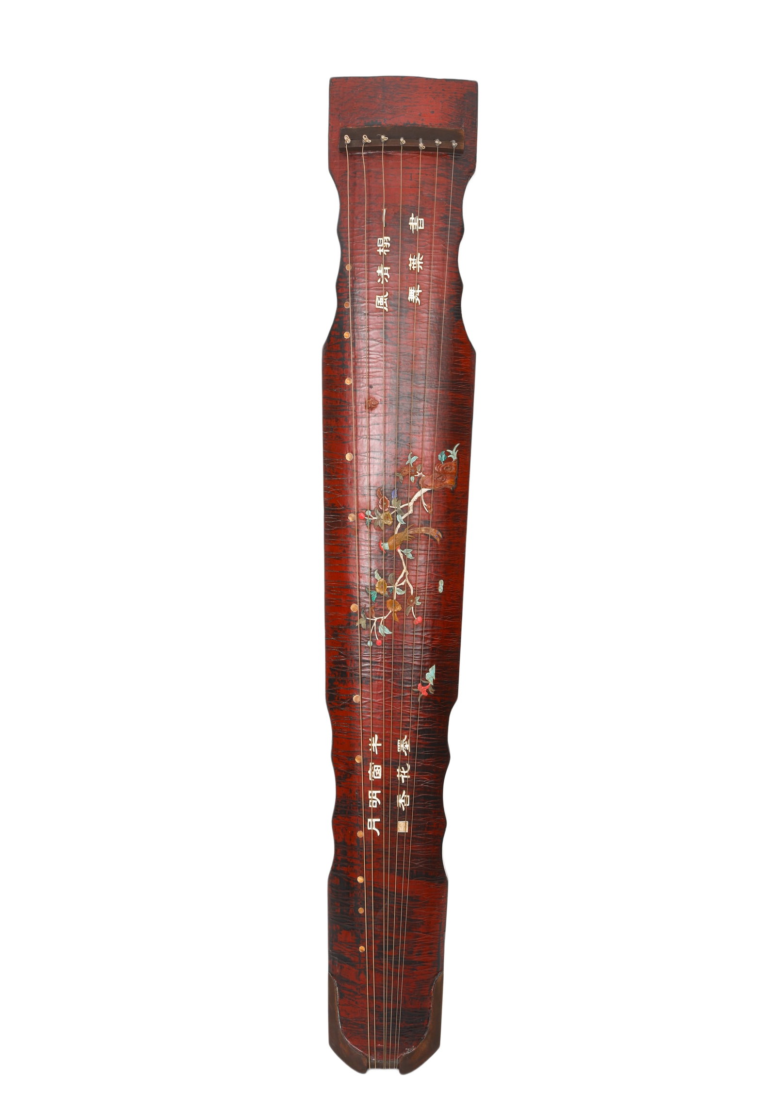 THE QING DYNASTY "GUGUOHUA" STYLE GUQIN WITH A HUNDRED TREASURES INLAID WITH FLOWER-AND-BIRD POETRY: H:22cm (8.66in) W:19cm (7.48in) Weight:5000g (11.02lb)This is a seven-string guqin in the Qing Dynasty style. The body is fully lacquered in red, with fine crackles on the surface, presenting an ancie