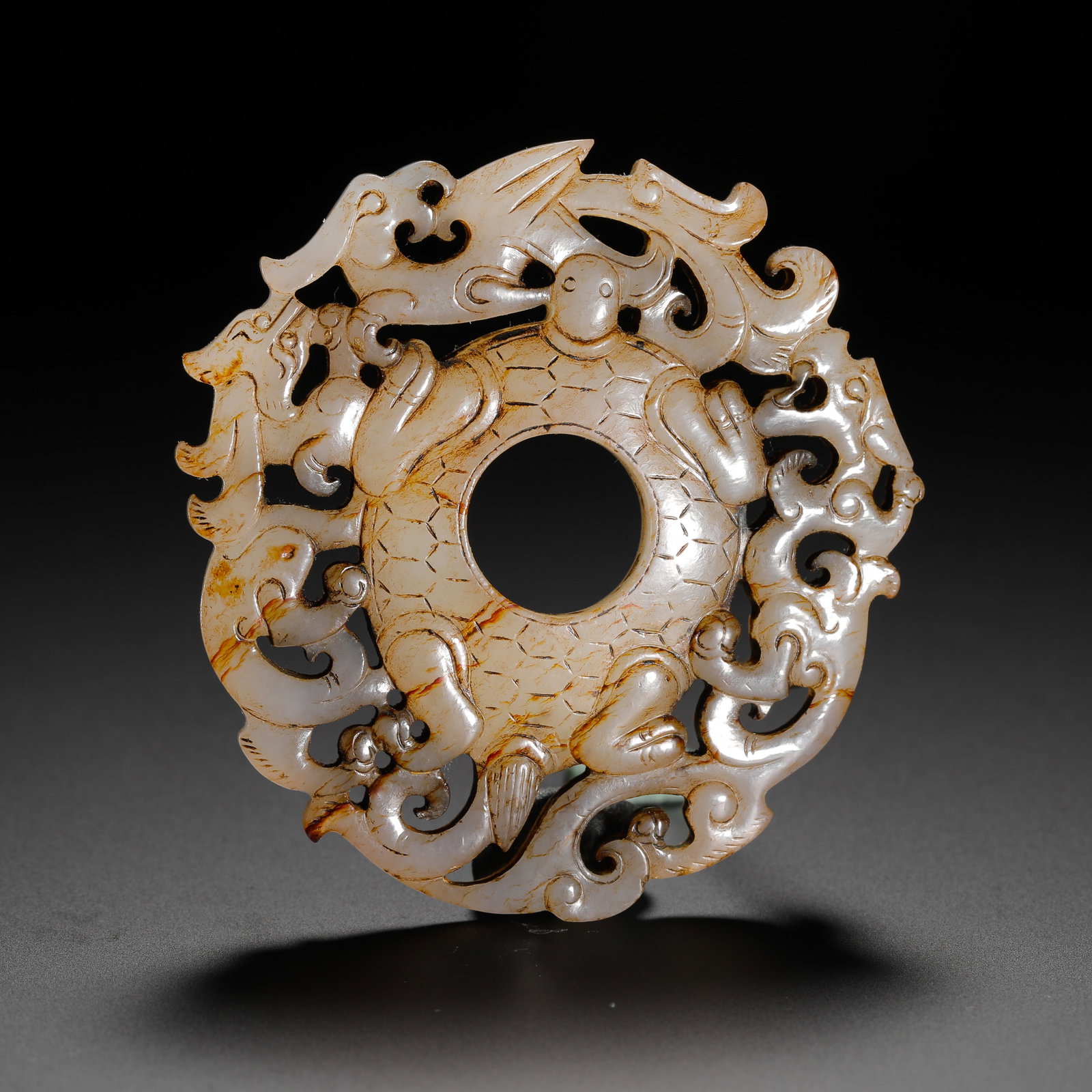 HETIAN JADE PENDANT OF THE HAN DYNASTY: H:6cm (2.36in) W:5.5cm (2.17in) Weight:30g (0.07lb)
