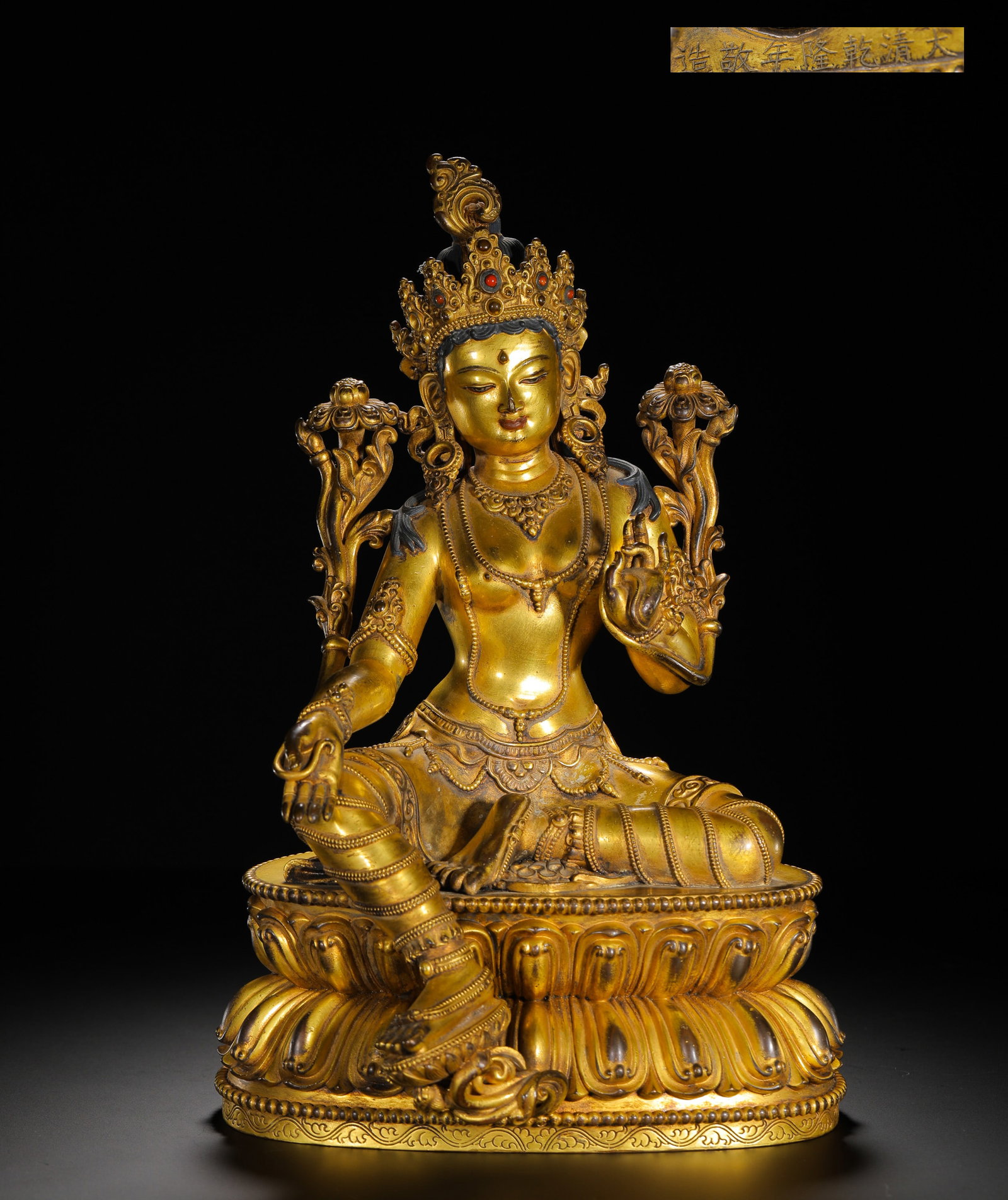 QING DYNASTY GILDED BRONZE STATUE OF THE GREEN TARA: H:32cm(12.60in)W:19cm(7.48in)Weight:4400g(9.70lb)Revered as the embodiment of active compassion, Green Tara is one of the most beloved deities in Tibetan Buddhism, making this statue a highly signific