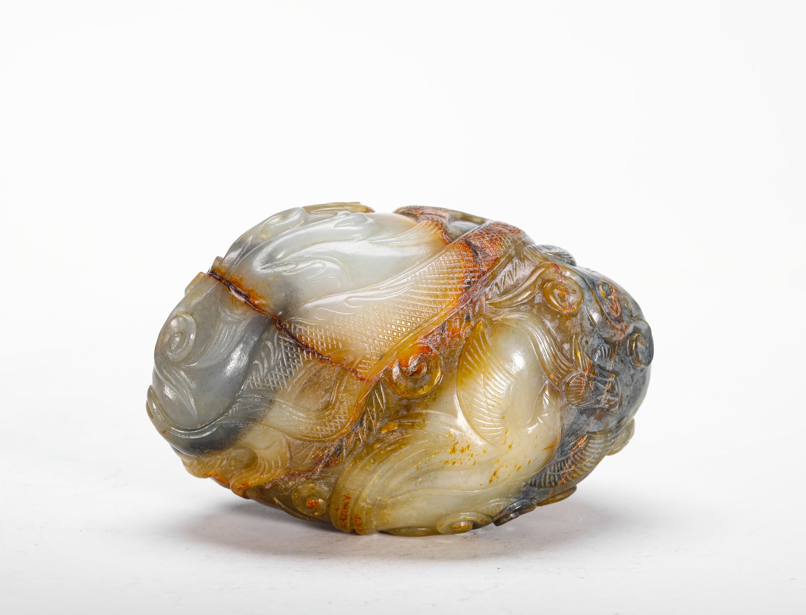 QING DYNASTY HETIAN JADE PENDANT WITH SKIN DRAGON AND PHOENIX PATTERNS: H:7cm (2.76in) W:12cm (4.72in) Weight:720g (1.59lb) This is a Qing Dynasty Hetian jade ornament, skillfully using the natural skin color and blue-white material of the jade to carve dragon and phoenix