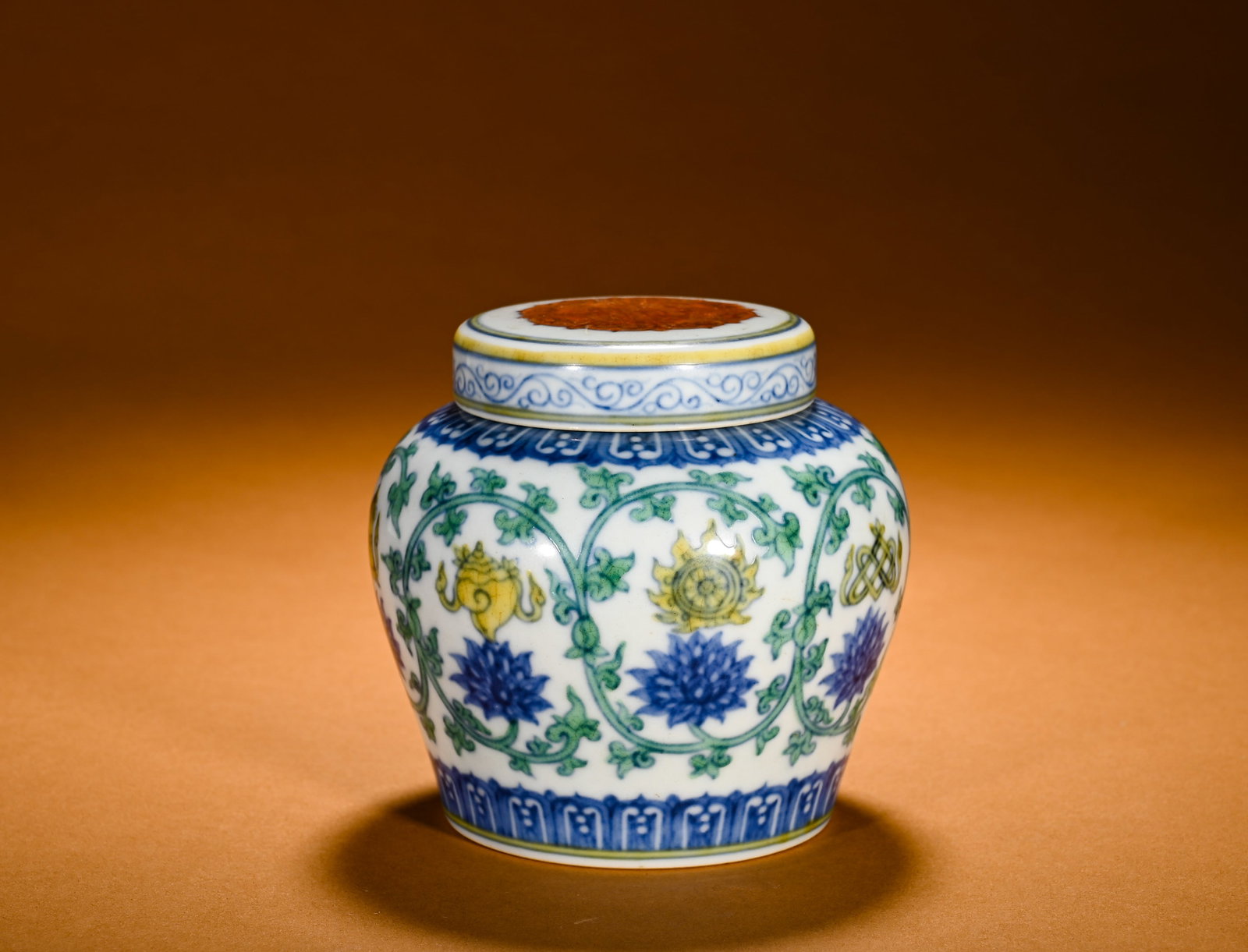 IN THE MING DYNASTY, IT WAS A BOWL-SHAPED JAR WITH A PATTERN OF EIGHT TREASURES AND A LOTUS ENTWINED (1 of 10)