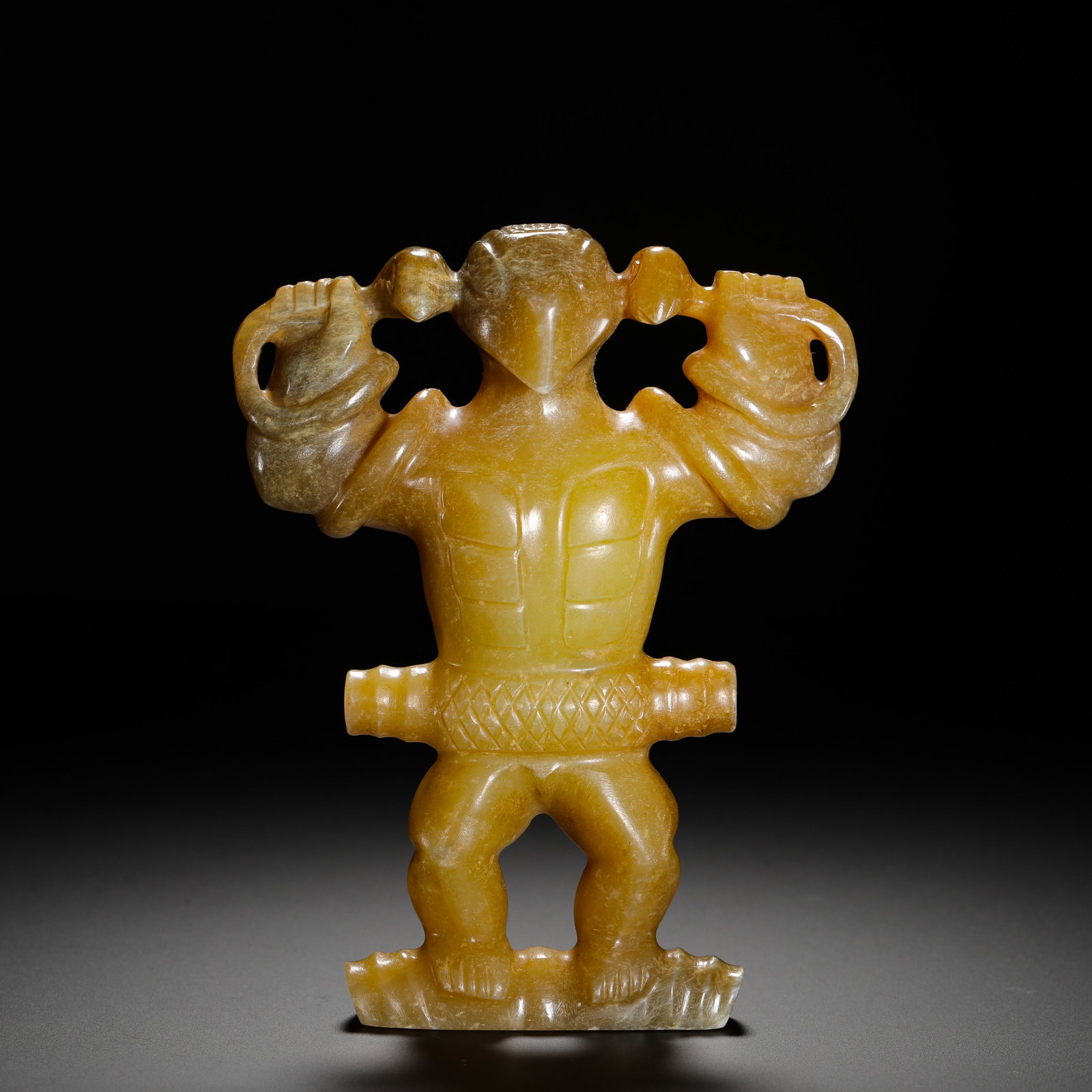 SHANG DYNASTY EAGLE HEAD WARRIOR HOLLOWED-OUT JADE PENDANT: Height:13cm(5.12in) Width:10cm(3.94in) Weight:326g(0.72lb)Ancient yellow jade hollowed pendant carved as eagle-headed deity figure. Integrated hollowed carving without splice, eagle totem head, arms r
