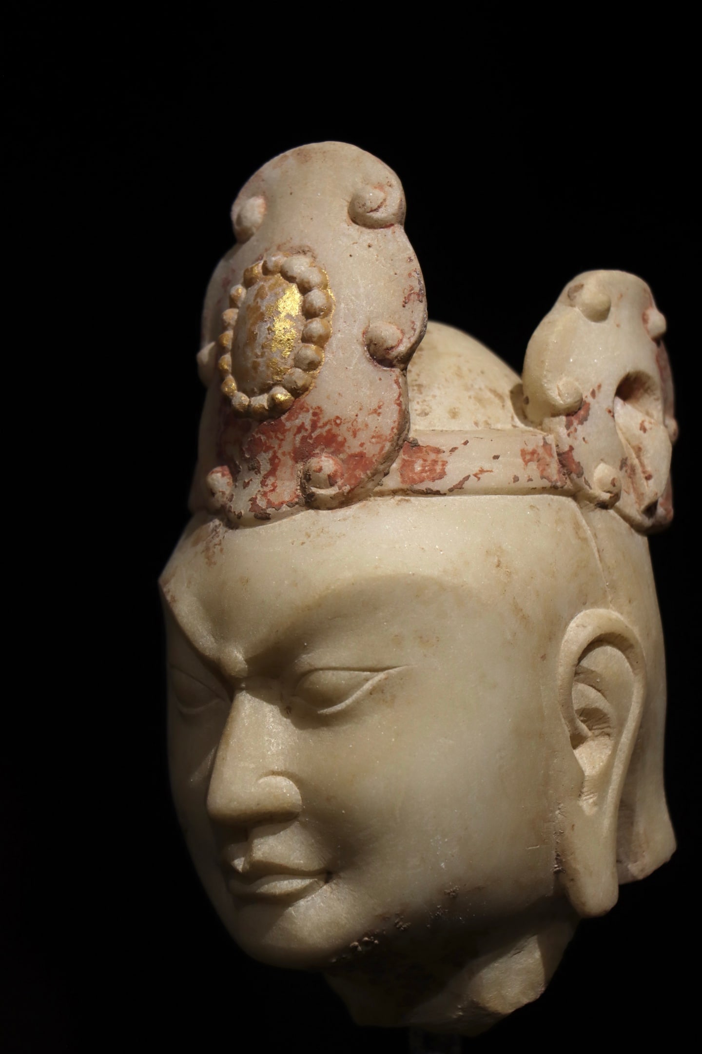 A WHITE MARBLE STRONGMAN'S HEAD FROM THE NORTHERN WEI DYNASTY (1 of 7)
