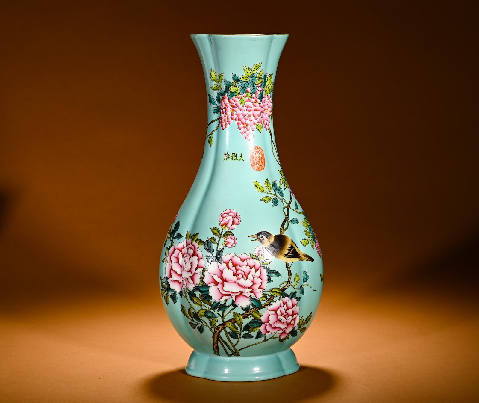 QING DYNASTY TURQUOISE GREEN GLAZE PASTEL FLOWER-AND-BIRD PATTERN BEGONIA-SHAPED BOTTLE: Height:5cm(1.97in)Width:19cm(7.48in)Weight:1620g(3.57lb)Famille rose begonia-shaped vase on turquoise-green glaze ground. Late Qing Dayazhai imperial shape with four-lobed body, flared rim and tapered