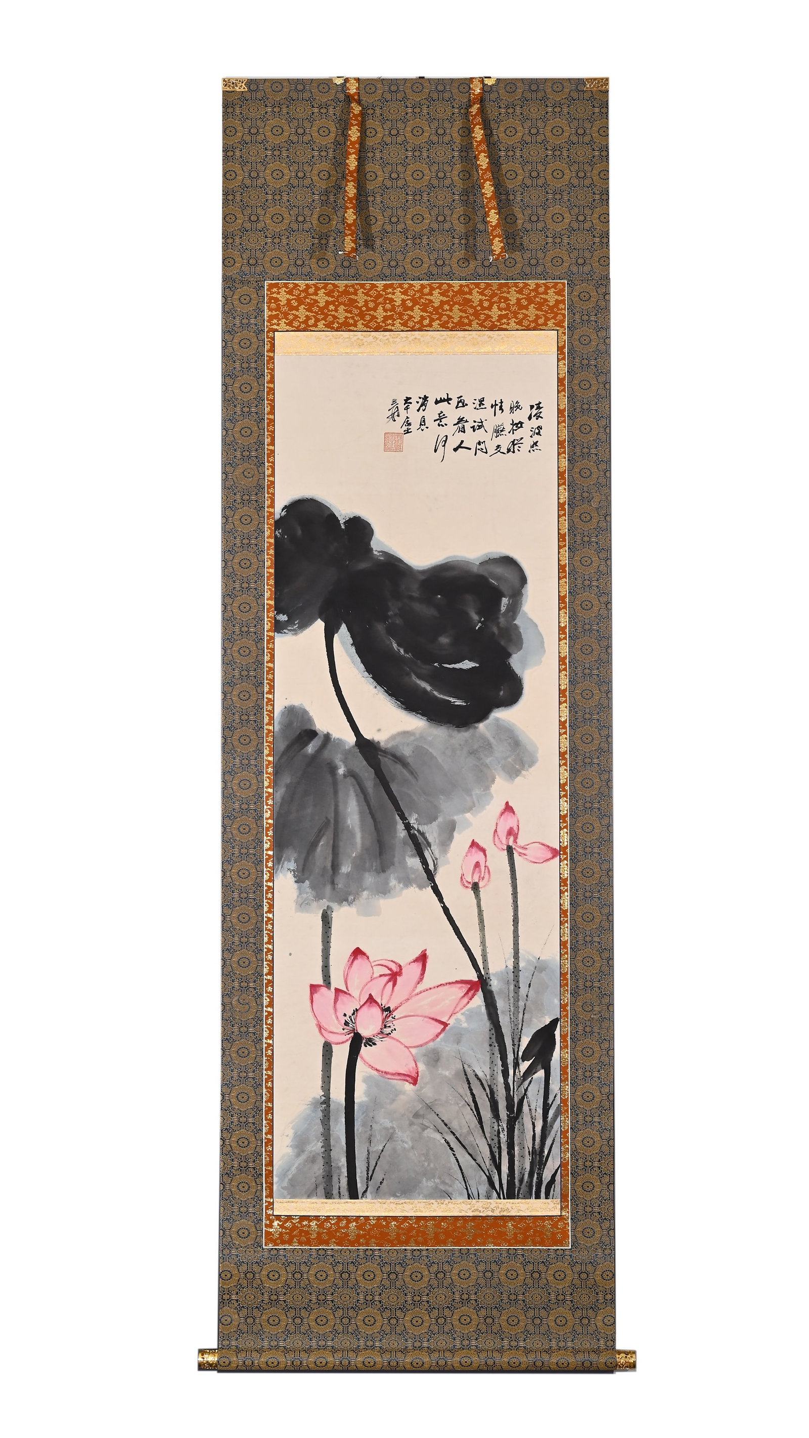 ZHANG DAQIAN (1899-1983) COLOR INK RED LOTUS VERTICAL SCROLL: Height:131cm(51.57in) Width:44cm(17.32in)Paper colored lotus vertical scroll by Zhang Daqian. Soft-toned ink painting of dark lotus leaves and pink blossoms, inscribed lotus poem and seal, woven gold